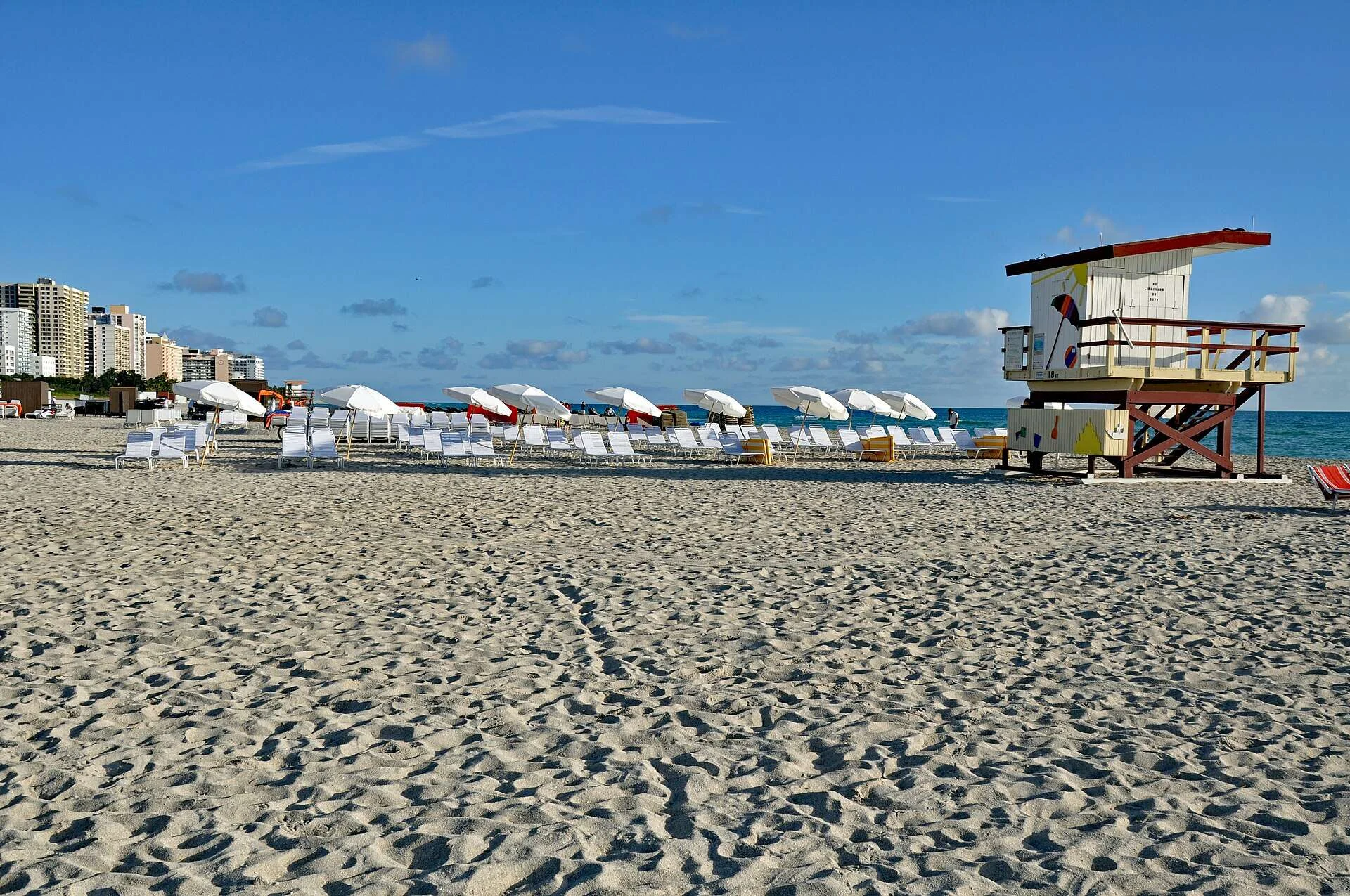 North Miami Beach shoreline with turquoise Atlantic Ocean, sandy beach, and lifeguard tower